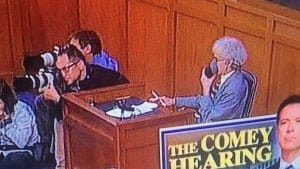 Comey Hearing court reporter using a stenomask